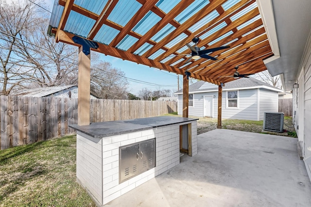 view of patio / terrace featuring central AC and ceiling fan