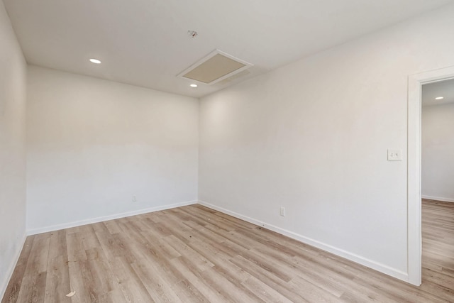 empty room featuring light hardwood / wood-style floors