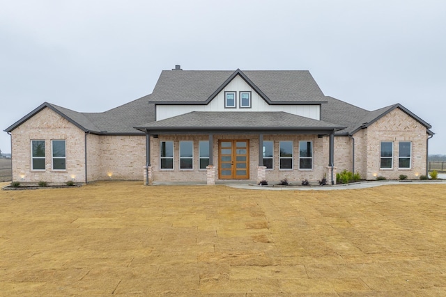 view of front facade featuring a front yard