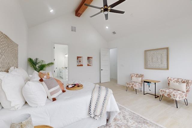 bedroom featuring ensuite bath, high vaulted ceiling, light hardwood / wood-style flooring, beamed ceiling, and ceiling fan