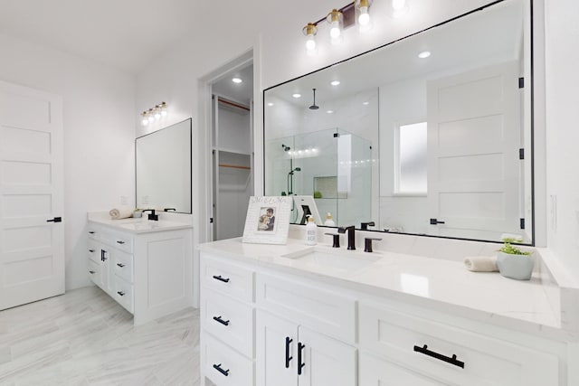 bathroom with vanity and walk in shower