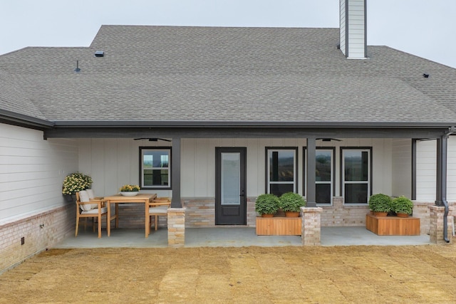 back of house with a patio and ceiling fan