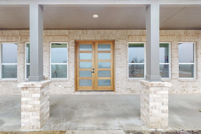 doorway to property featuring french doors