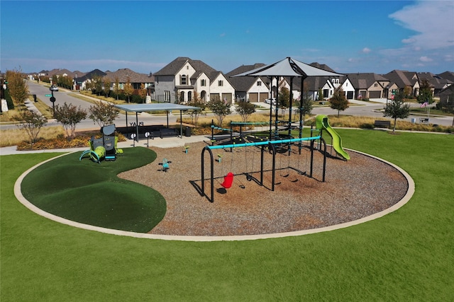 surrounding community with a playground and a lawn