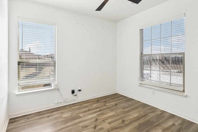 unfurnished room with wood-type flooring and ceiling fan