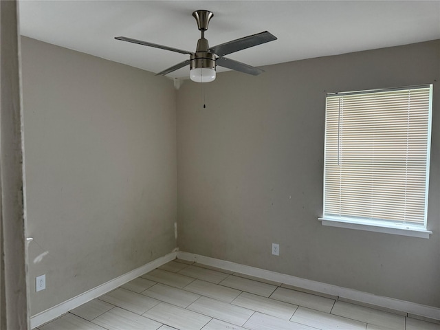 unfurnished room featuring ceiling fan