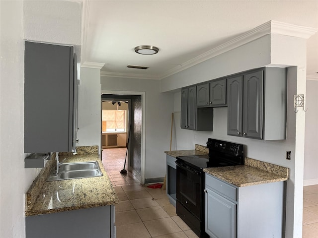 kitchen with light tile patterned flooring, sink, crown molding, black / electric stove, and gray cabinets