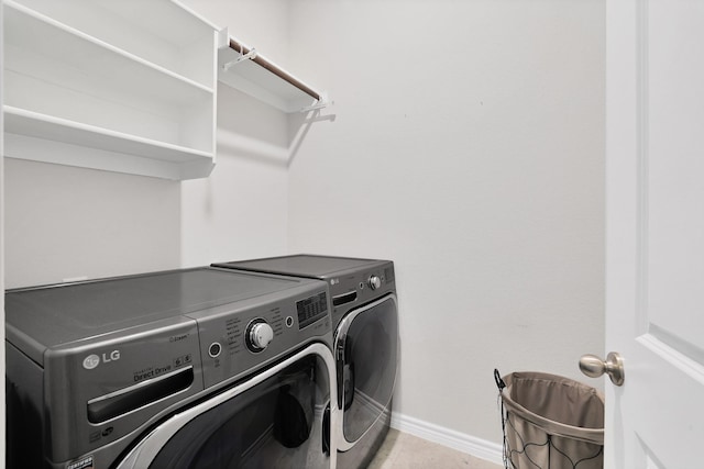 laundry area with separate washer and dryer