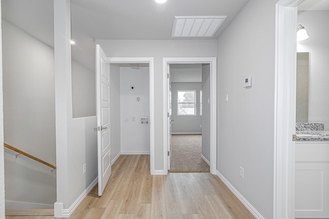 hallway featuring light wood-type flooring