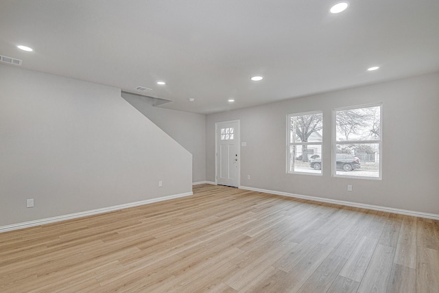 foyer with light hardwood / wood-style flooring