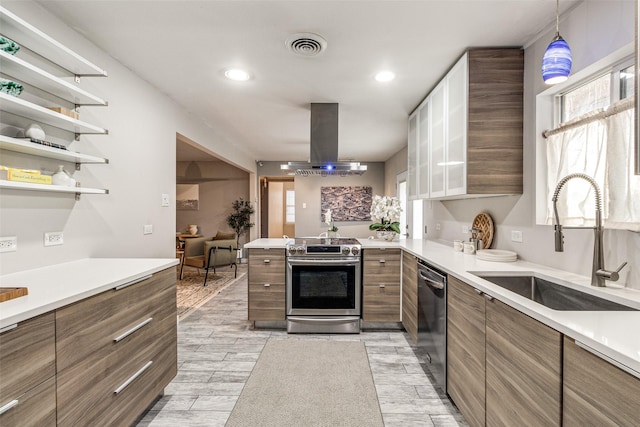 kitchen with island range hood, decorative light fixtures, dishwasher, sink, and stainless steel electric range