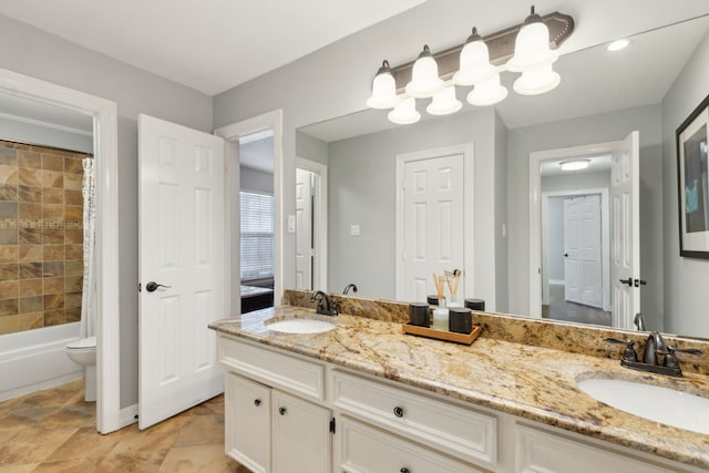 full bathroom featuring shower / bathtub combination with curtain, vanity, and toilet