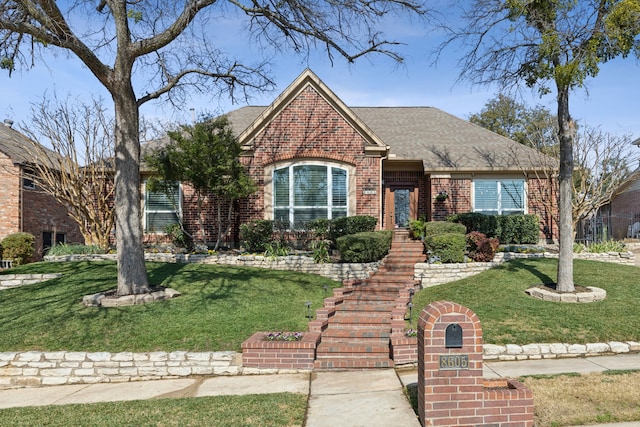 view of front of property with a front lawn