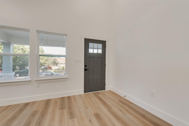 foyer with light wood-type flooring