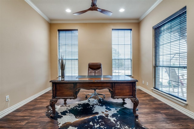 office area featuring crown molding, a healthy amount of sunlight, dark wood-type flooring, and ceiling fan