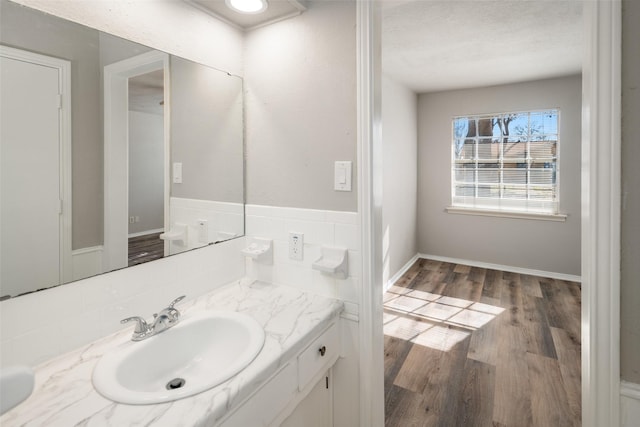 bathroom featuring vanity and wood-type flooring