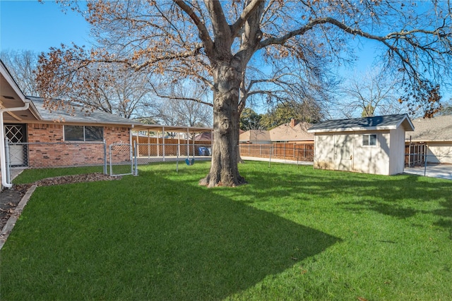 view of yard with a storage unit