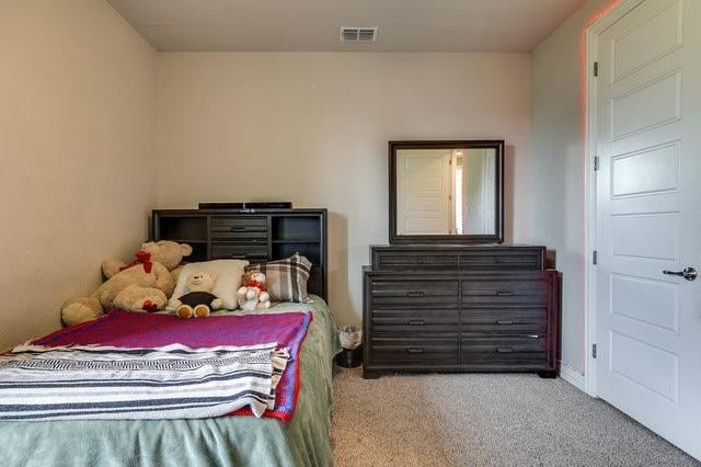 bedroom featuring carpet floors