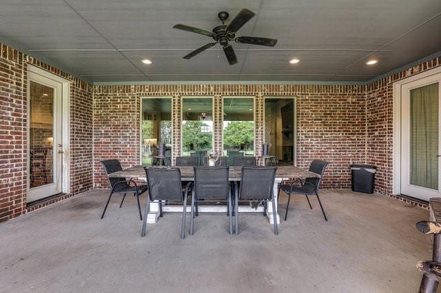 view of patio / terrace featuring ceiling fan