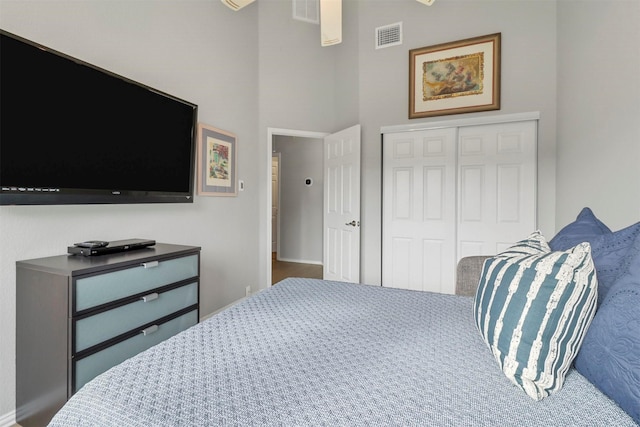 bedroom with visible vents and a closet