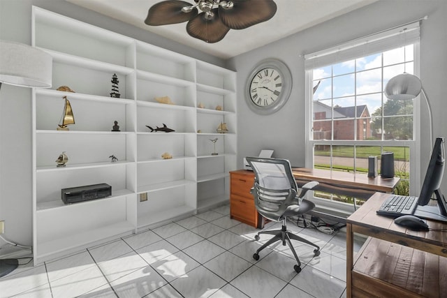 office area with ceiling fan and light tile patterned flooring