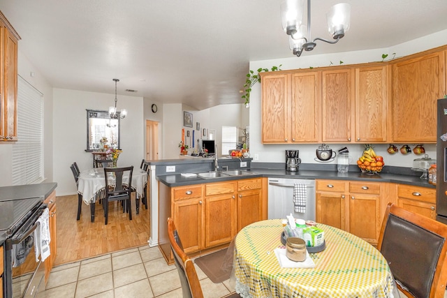 kitchen with pendant lighting, dishwasher, sink, a notable chandelier, and electric range