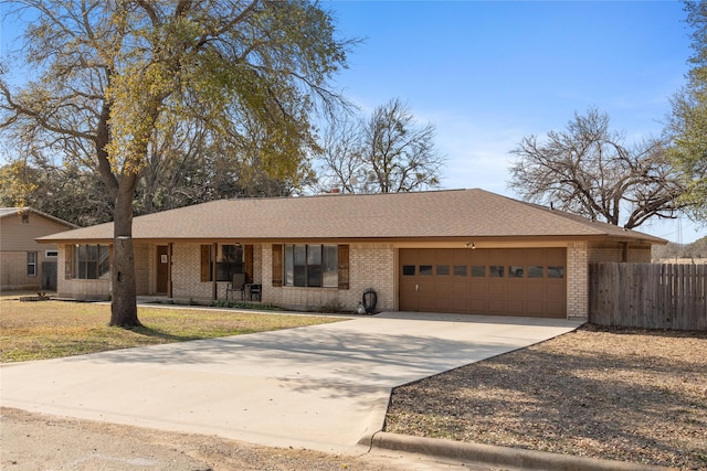 ranch-style house featuring a garage