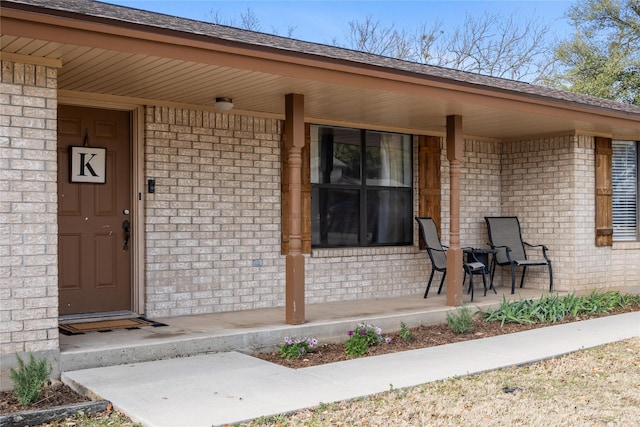 entrance to property with covered porch