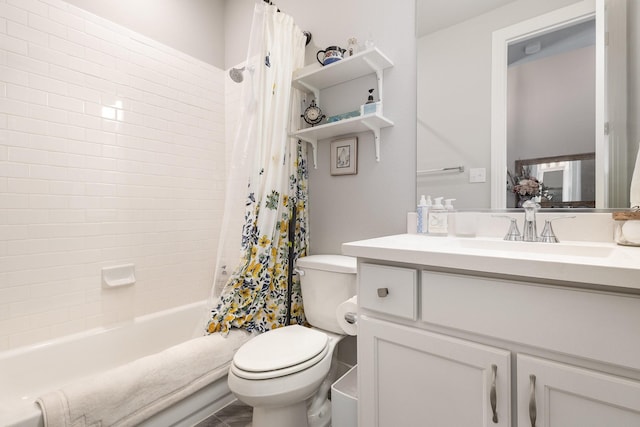 full bathroom featuring shower / tub combo with curtain, vanity, and toilet