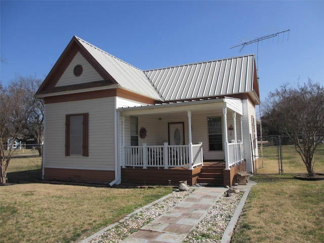 view of front of home featuring a front yard and a porch