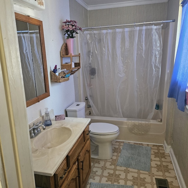 full bathroom with ornamental molding, vanity, toilet, and shower / tub combo