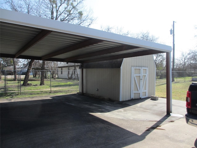 view of outdoor structure with a carport