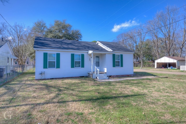 single story home with a front yard