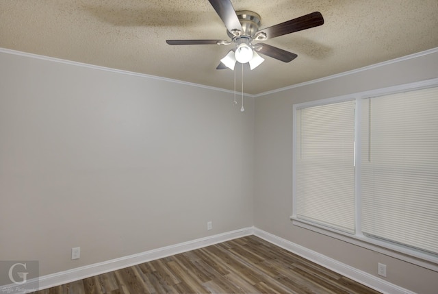 empty room featuring ornamental molding, dark hardwood / wood-style floors, ceiling fan, and a textured ceiling