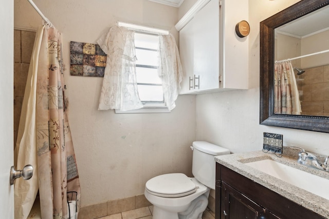 bathroom featuring vanity, curtained shower, and toilet