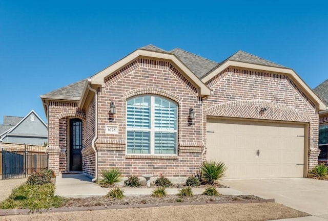 view of front of home featuring a garage