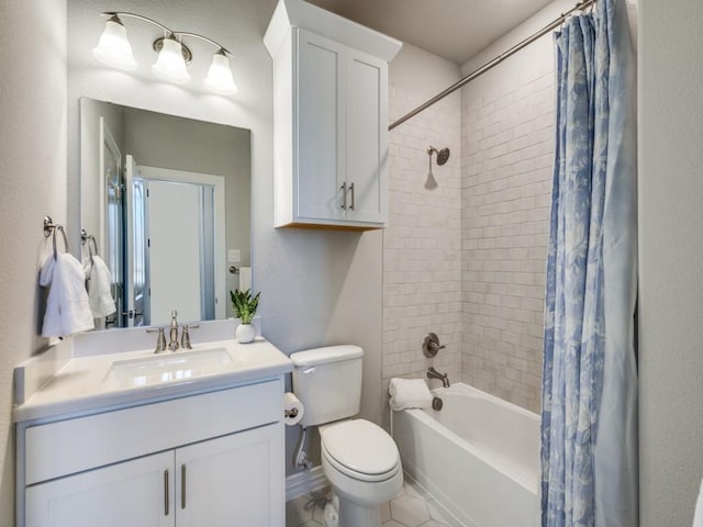 full bathroom featuring vanity, tile patterned floors, toilet, and shower / bath combo