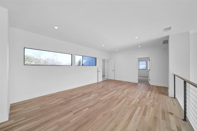 unfurnished room featuring light wood-type flooring