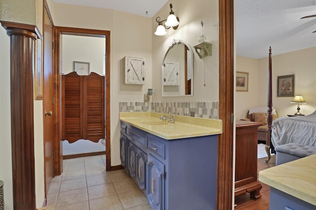 bathroom featuring tile patterned floors and vanity