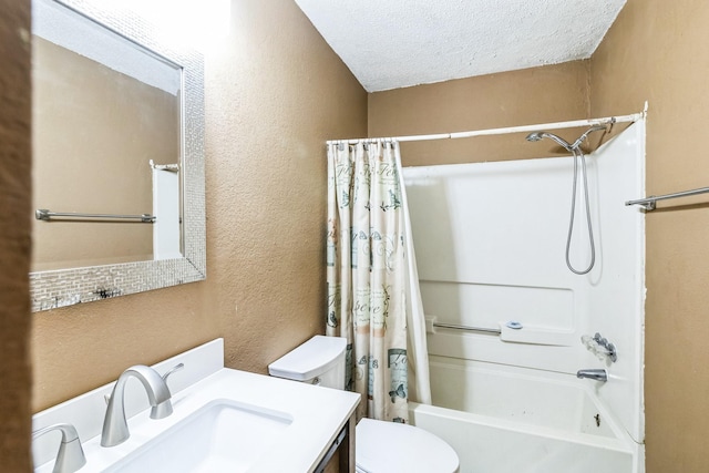 full bathroom with vanity, toilet, a textured ceiling, and shower / bath combo with shower curtain