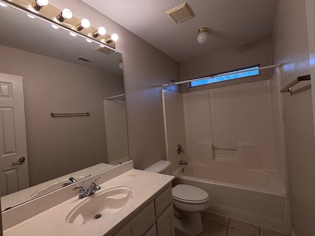 bathroom featuring toilet, shower / bath combination, visible vents, and tile patterned floors