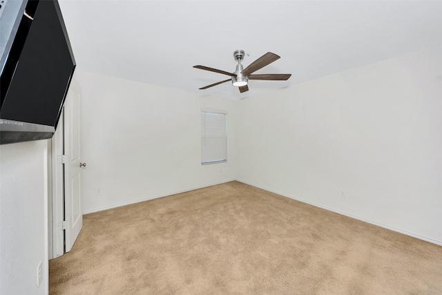 interior space featuring ceiling fan