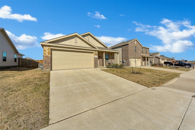 view of front of home featuring a garage and a front lawn