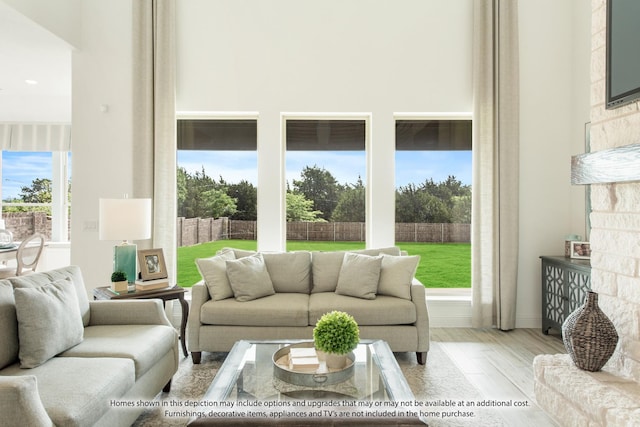 living room with light hardwood / wood-style flooring