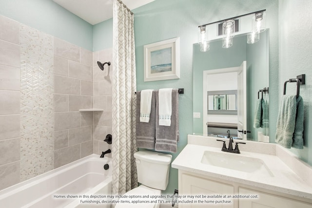 full bathroom featuring shower / bath combination with curtain, vanity, and toilet