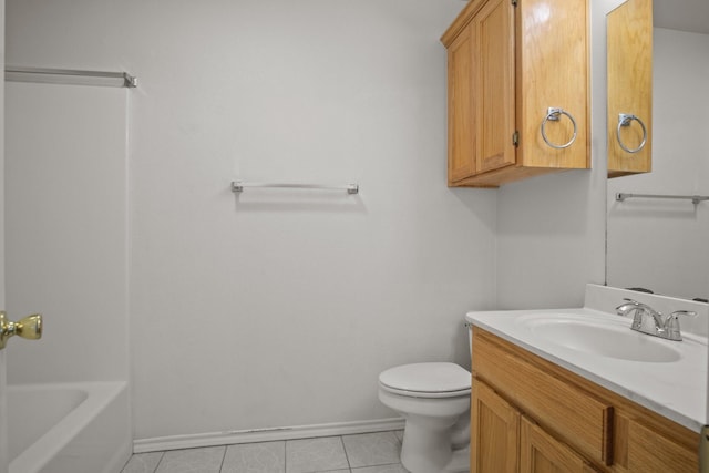 bathroom with vanity, a bath, tile patterned floors, and toilet