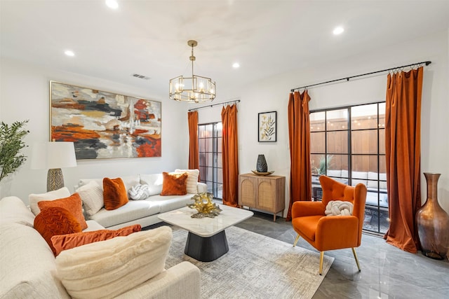 living room with an inviting chandelier