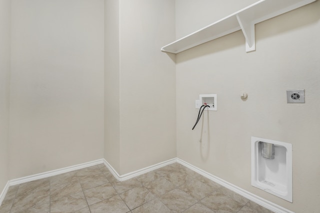 laundry area with gas dryer hookup, hookup for a washing machine, and electric dryer hookup