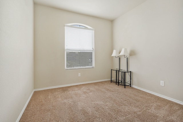 empty room featuring carpet flooring