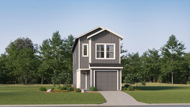 view of front of property featuring a garage and a front yard